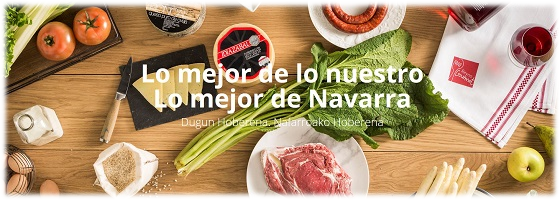 Mesa de cocina con productos típicos navarros, como borraja, espárragos, chistorra, ternera o queso curado de oveja 